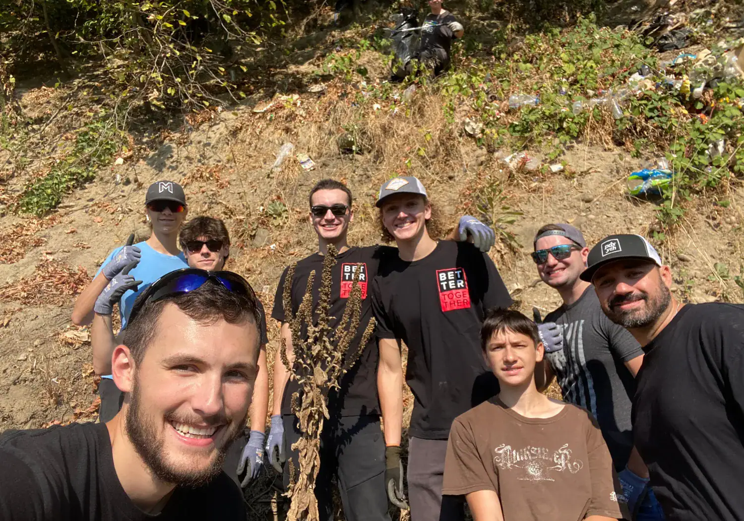 pcc youth picking up trash for clean water